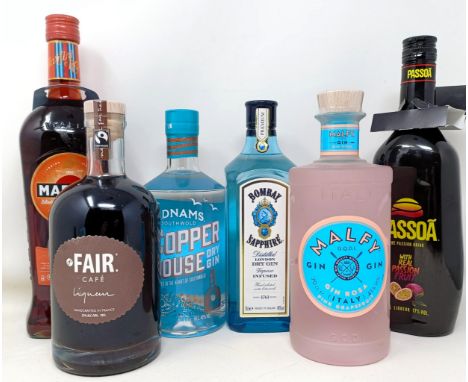 A bottle of Malfy gin, a bottle of Fair Cafe Liqueur, and other bottles (6) 