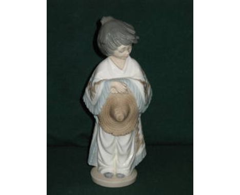 NAO GLAZED CERAMIC FIGURE- GIRL WITH SOMBRERO, APPROXIMATELY 28cm HIGH 