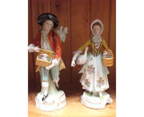 PAIR OF CONTINENTAL STYLE GLAZED CERAMIC FIGURES 