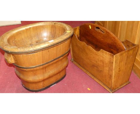 A pitched pine metal bound oval shallow trough, together with a further pitched pine and metal bound twin handle planter and 