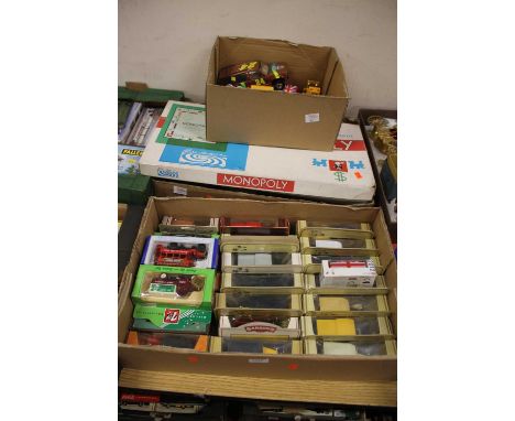 Three boxes containing a collection of mixed modern issue diecast, to include Matchbox Models of Yesteryear, Monopoly Real Es