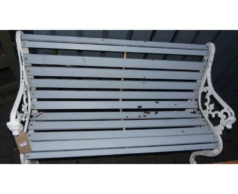 A white painted cast metal ended and grey painted timber slatted two-seater garden bench, width 132cm
