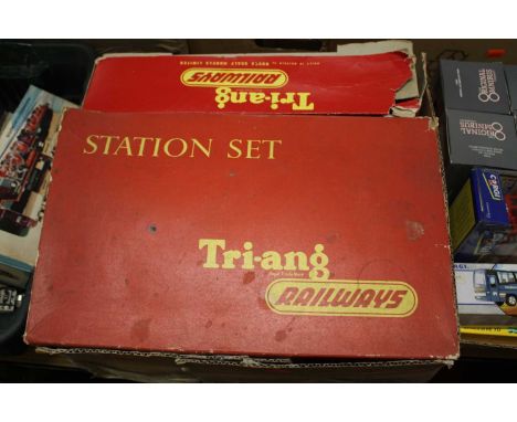Two boxes of mixed railway effects, to include Triang, Marklin and others, specific examples to include a Triang Railways sta
