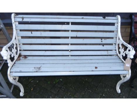 A white painted cast metal ended and grey timber slatted two-seater garden bench, width 132cm