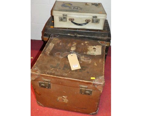A canvas bound square trunk with leather capped corners, w.45cm; together with a canvas metal bound trunk; and a mid-20th cen