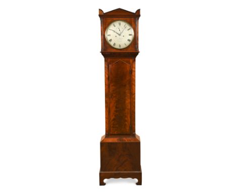 A Regency figured mahogany longcase clock,the hood with triangular pediment above canted sides and 31cm circular silvered dia