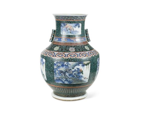 A Chinese porcelain large underglaze blue Hu arrow vase, Qing Dynasty, 19th century,painted with four panels enclosing wild a