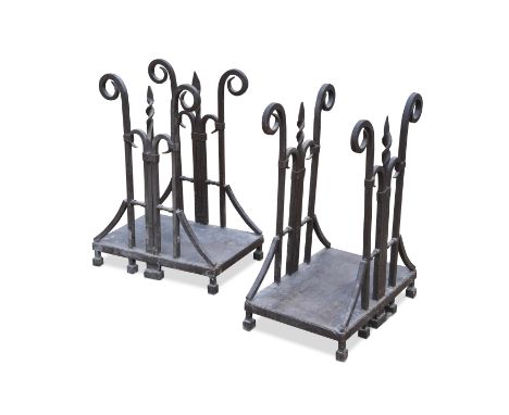 A pair of wrought iron log cages, 20th century63 x 47 x 31cmCondition report: with some light rust and wear