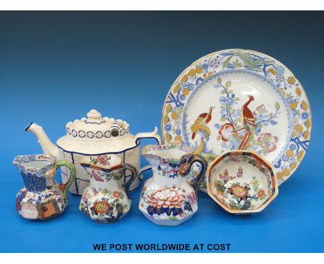 A Castleford teapot with relief decoration and  hinged lid, Masons jugs, plate etc