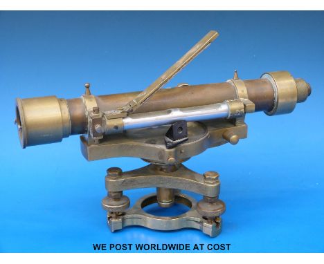 A brass surveyor's level with built in compass 