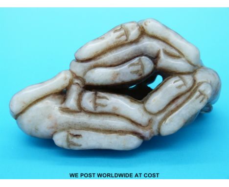 A Chinese jade carving of various horses and lingzhi (9.5cm x 6cm x 4cm)