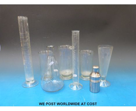 A quantity of glass measuring laboratory/medical jugs etc together with a glass spirit lamp, hygrometres, spigots, glass cath