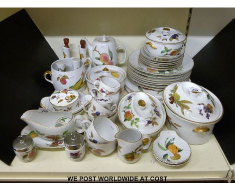 A large collection of Royal Worcester Evesham to include casserole dishes, sauce boat and soufflé dishes 