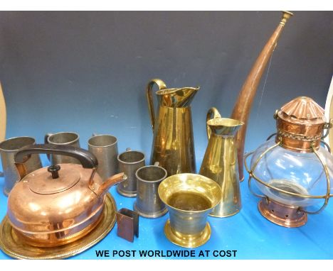 Mixed brass and copperware including trench art, Hurricane lamp, jugs, copper kettle etc