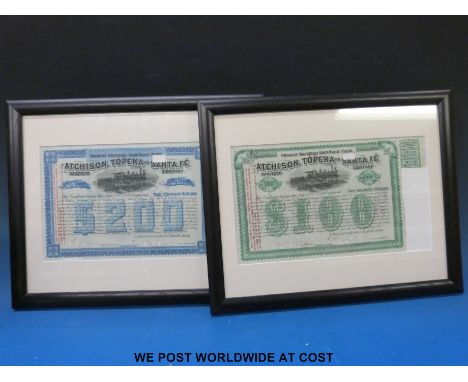 Two Atchison Topeka and Santa Fe railway share certificates, $200 and $100, together with a lamp marked Santa Fe R R
