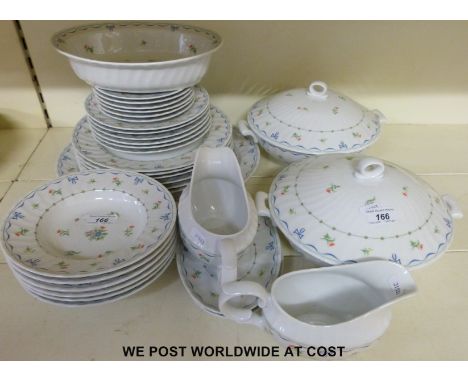 A quantity of Royal Worcester 'Ribbons and Bows' dinnerware 