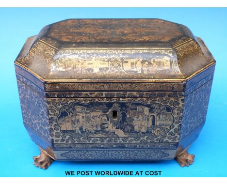 A 19thC Chinese lacquer papier maché tea caddy raised on lion pad feet (14cm tall) 