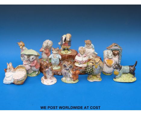 Fourteen Royal Albert Beatrix Potter figures and a Beswick ceramic base