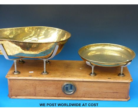 Shop-fitting haberdashery interest: A large set of scales the large brass pans impressed with proof marks and "Trenta" to pan