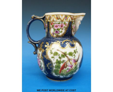 A Worcester style Samson or Paris porcelain blue scale mask jug with blue cross first mark to base