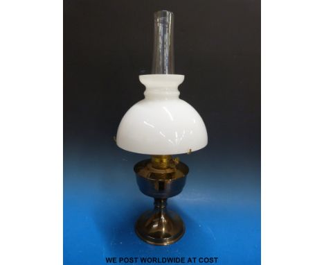 Brass oil lamp with glass shade