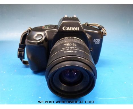 A Canon eos 850 SLR camera, various films etc 