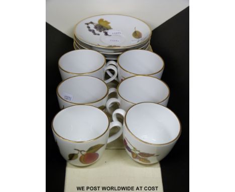 Six Royal Worcester "Evesham" pattern cups and saucers