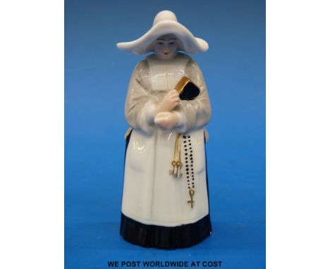 A Royal Worcester abbess / nun candle snuffer with puce mark