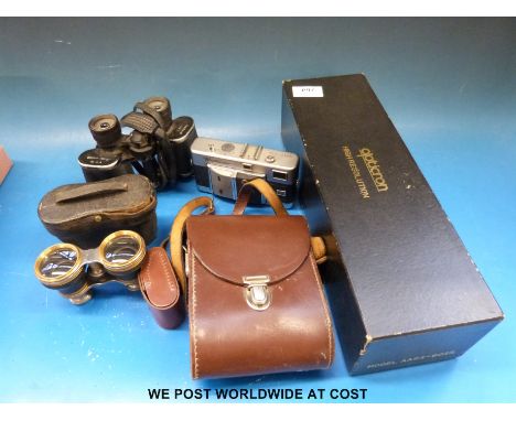 A Voigtlander Vitessa camera, Opticron spotting scope, binoculars etc 