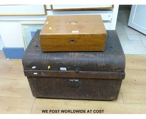 A tin trunk and an oak canteen