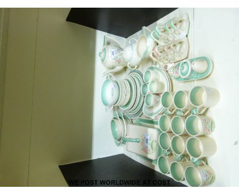 A collection of Susie Cooper items to include a cheese dish, two toast tacks and a cruet set, together with salad plates, sou