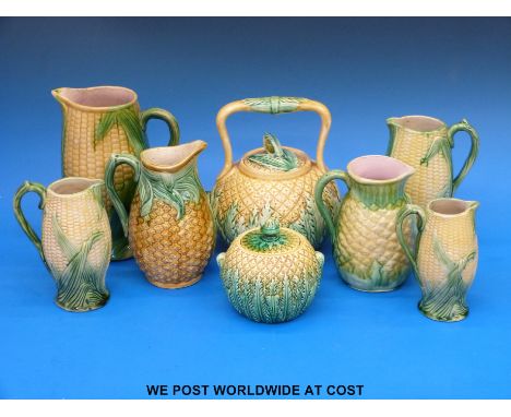 A set of four graduated corn on the cob majolica jugs, majolica teapot etc