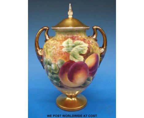 A Royal Worcester painted fruit two-handled, lidded pedestal vase, signed by J Sherett (21cm tall) 