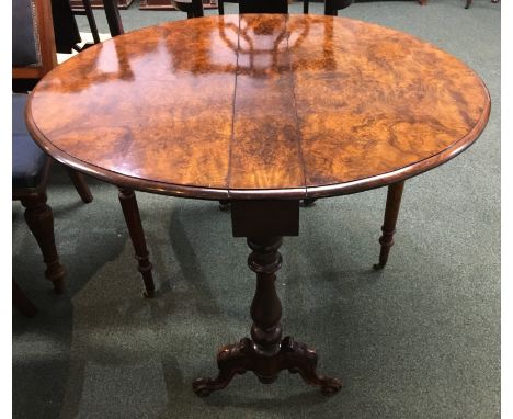 Walnut and mahogany oval gate-leg occasional table, quarter veneer walnut top, baluster turned columns and stretcher, carved 