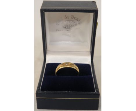 18-carat gold ring set with a small diamond, weight of ring 3.0g (size for guidance only M/N), in a blue ring box