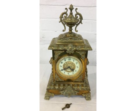 French striking brass mantle clock by Japy Freres, movement stamped 14541, Arabic chapter with pierced gilt metal leopard's h