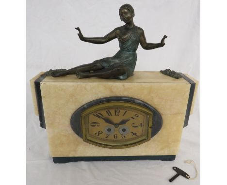 French Art Deco striking marble mantle clock mounted with spelter figure, the movement signed E.M. Paris 139 42 30, yellow an