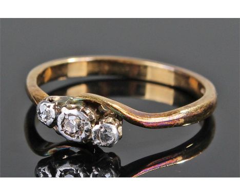 18 carat gold diamond set ring, with a row of three diamonds, ring size O