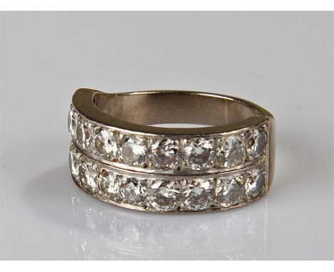 Large white metal diamond set ring, with two bands of eighteen brilliant cut diamonds, ring size U
