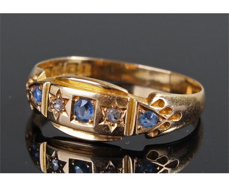 18 carat gold sapphire and diamond ring, set with three sapphires and two diamonds, ring size P