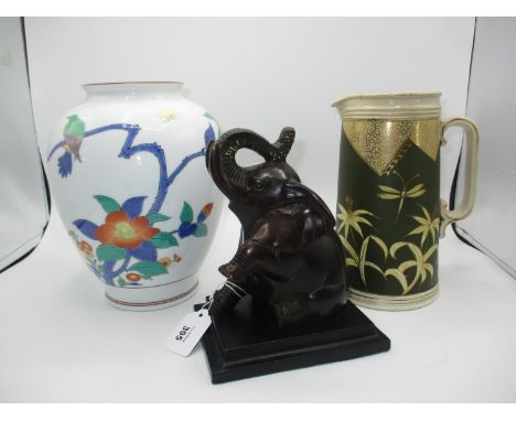 Bronzed Elephant Bookend, Japanese Porcelain Vase and a Victorian Pottery Jug