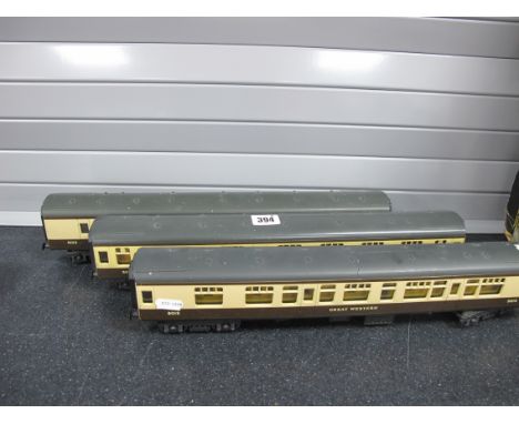 Three Lima 'O' Gauge/7mm Unboxed Great Western Brown/Cream Coaches, a brake/3rd R/No 5103 and two composites R/No 5015, overa