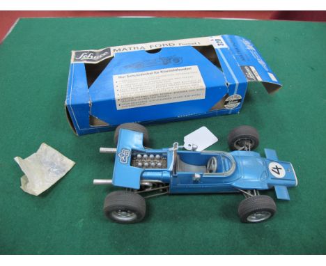 A Schuco Matra Ford Formel 1 (Formula One) No. 1074 Clockwork Model Racing Car, light metallic blue body, Car No. 4, complete