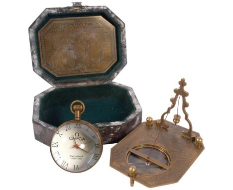 A reproduction boxed sundial compass, L11cm, and a ball design fob watch
