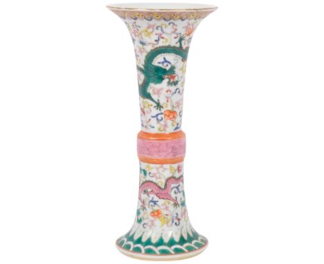 A Chinese ceramic vase, with polychrome enamelled dragon and floral decoration, with character mark, 22cm