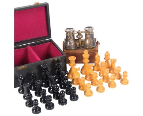 A turned wood chess set in box, King height 8cm, and Antique Lumiere Paris opera glasses with embossed bird decoration, cased