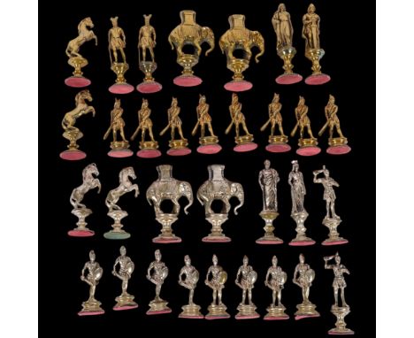 A set of cast-metal chess pieces, in the form of animals and figures, tallest 9cm