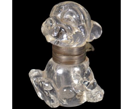 A 1930s Bonzo glass inkwell, H8.5cm, from the Gay Owen CollectionHinge is loose to top but still attached, small chip to 1 ea