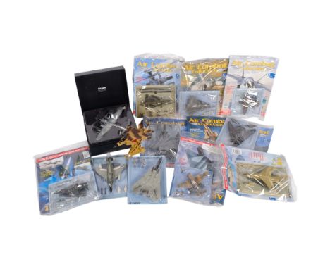 Boxed Corgi diecast aeroplane, various other planes, and Air Combat magazines