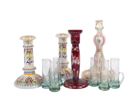 A pair of faience candlesticks, 19cm, a German porcelain embossed candlestick painted with flowers, mark under, a ruby glass 